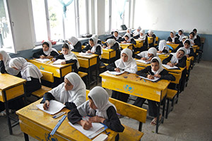 Girls study at the Sultan Razia High School in Mazar-e-Sharif, Balkh Province. (Photo: UN Photo/Shehzad Noorani)