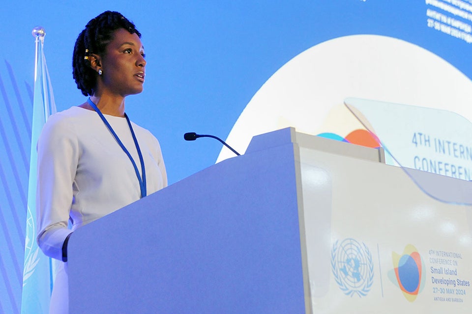 Meghan Theobalds of the Equality Fund reporting on the Gender Equality Forum at the SIDS4 during the Moment of Declaration. Photo: IISD/ENB/Diego Noguera.