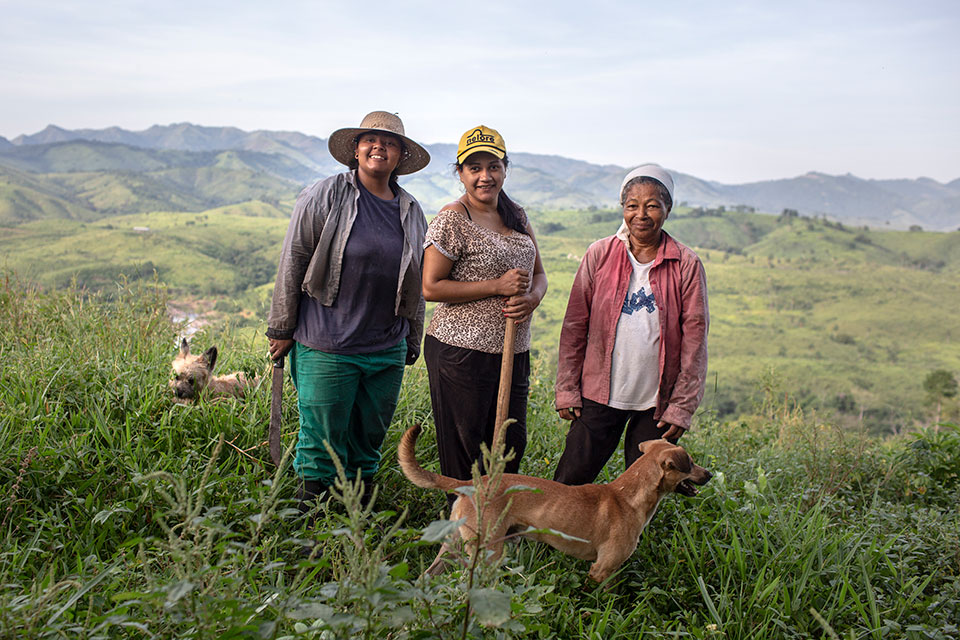 Janete Dantas, centre, with her mother, Maria Nilda, right, and her sister, Mayla, left, on their family farm. Photo: Lianne Milton