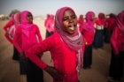 School girls from El Sereif perform traditional songs and dances during the cultural and sports event organized by UNAMID. Photo: UN Photo/Albert González Farran